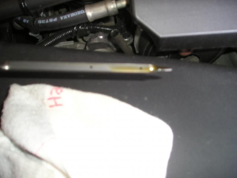 ('09'13) 2011 oil report and dipstick image after oil change Subaru