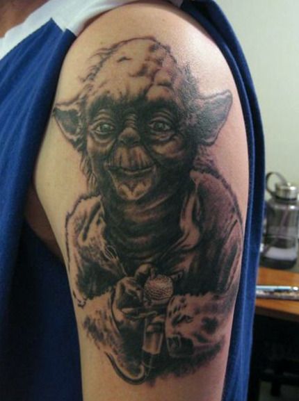 DJ Yoda Tattoo. Via Ugliest Tattoos, who rocks a mic like a vandal.