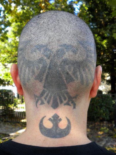 Curiously, Jude also has a tattoo of the symbol of the Rebel Alliance from