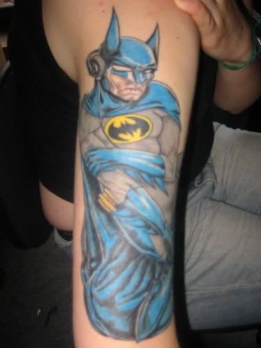 J.J. sent me an awesome photo and description of her Batman tattoo that are 
