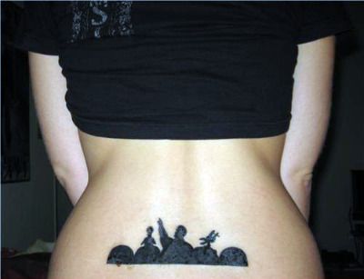  permanent ink stain right above her ass. Via Ugliest Tattoos, who thinks 