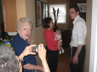 Bubbie snapping a pic of Ellie with Great-Aunt Sue, Uncle Noah and Nonny