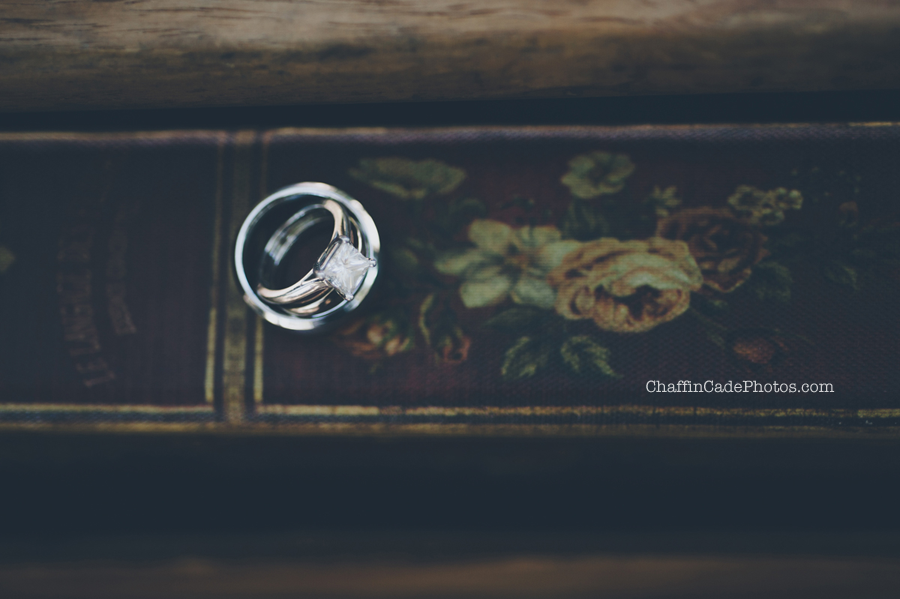 a large diamond ring on a vintage book with a floral binding in Malibu, California