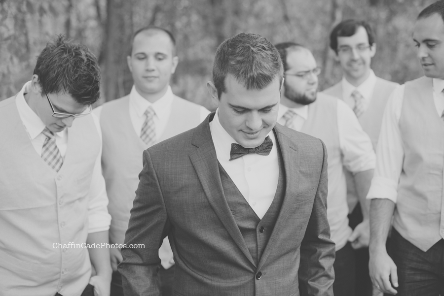 a black and white shot of Mike and his groomsmen