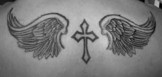 cross tattoos with wings on back. 100%. wings