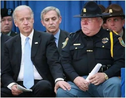 Joe Biden with hand on sheriff's leg photo: Biden Wandering Hand Joe-Biden-wandering-hand.jpg